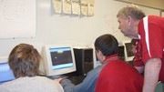 Pictured is (l to r) Taylor Rhone, Gus Gesling, and Mr. McVey.