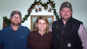 Mrs. McVey surrounded by her big brothers: Matt and Ben.