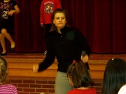 Mrs. McVey teaching the elementary students dance class on Friday mornings.