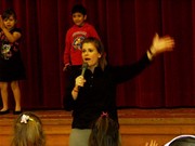 Mrs. McVey teaching the elementary students dance class on Friday mornings.