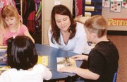 Mrs. Parr working with a few of her students.