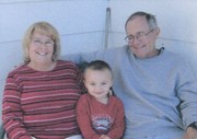 Proud grandparents, Jery and Jane Bailey with grandson Tregan